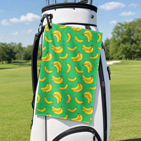 19th Hole Bogey Banana Green Golf Towel - Hanging on a Golf Bag