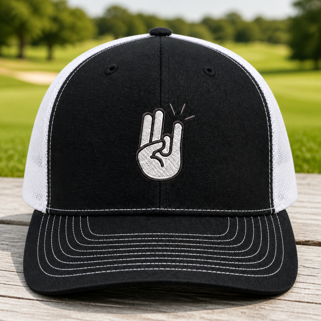 Two In Pink One In Stink Embroidered Trucker Hat - Front View, Black - White