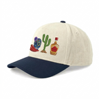 Chèvre sur le chapeau vert