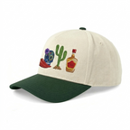 Chèvre sur le chapeau vert