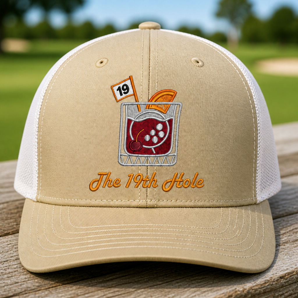 The 19th Hole Embroidered Trucker Hat - Front View, Khaki - White