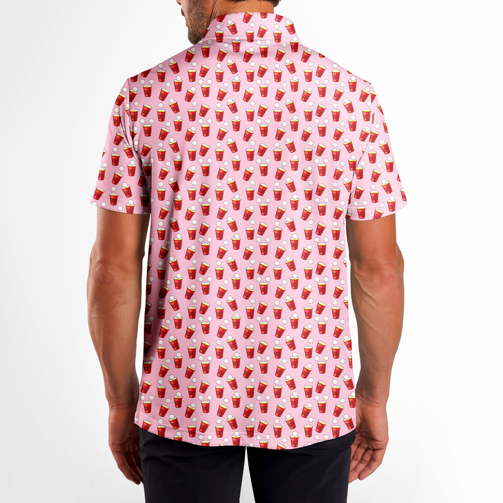 Red Solo Cup men's golf shirt in Pink on a golfer, back view