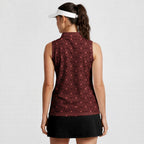 Lone Spur women's sleeveless golf shirt in Red on a golfer, back view