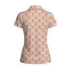 Lone Spur women's golf polo in Orange, back flat lay