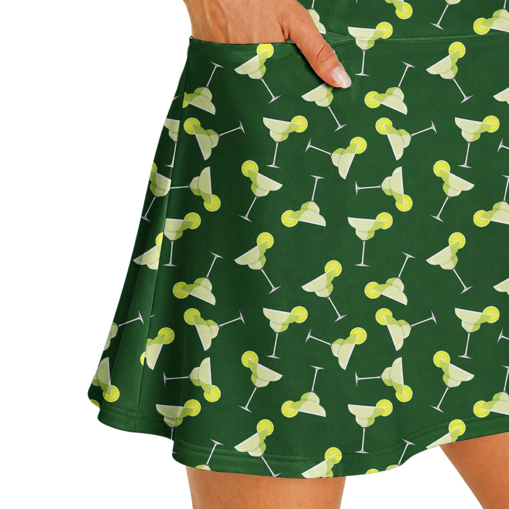 19th Hole Margarita Cocktail Slice Lime golf dress in Green, side pocket holding a golf ball