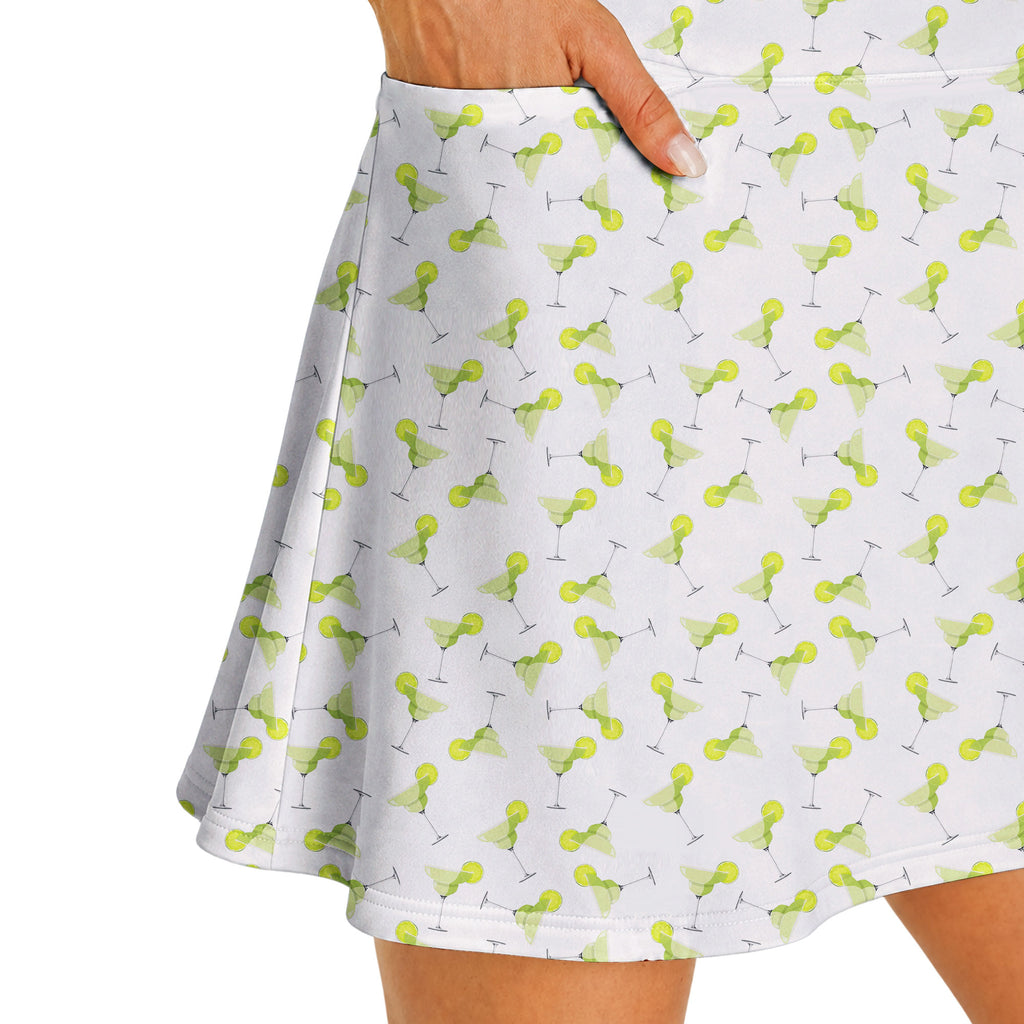 19th Hole Margarita Cocktail Slice Lime golf dress in White, side pocket holding a golf ball